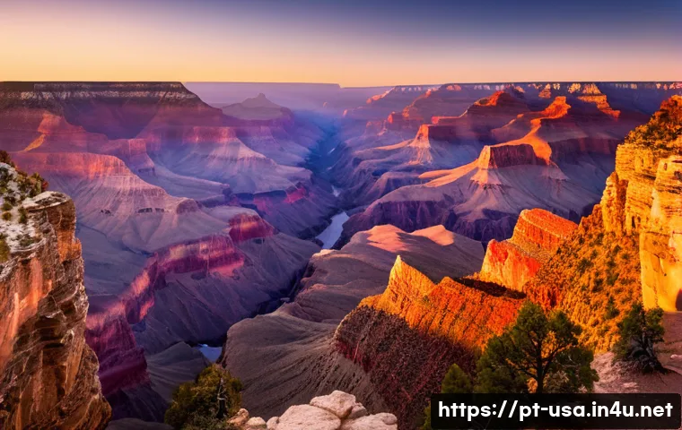 미국 그랜드캐년 여행 - A breathtaking panoramic view of the Grand Canyon South Rim at sunrise, showcasing golden sunlight i...
